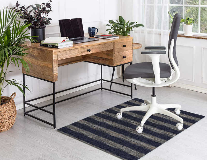 Rectangular low pile carpet with dark blue horizontal stripes