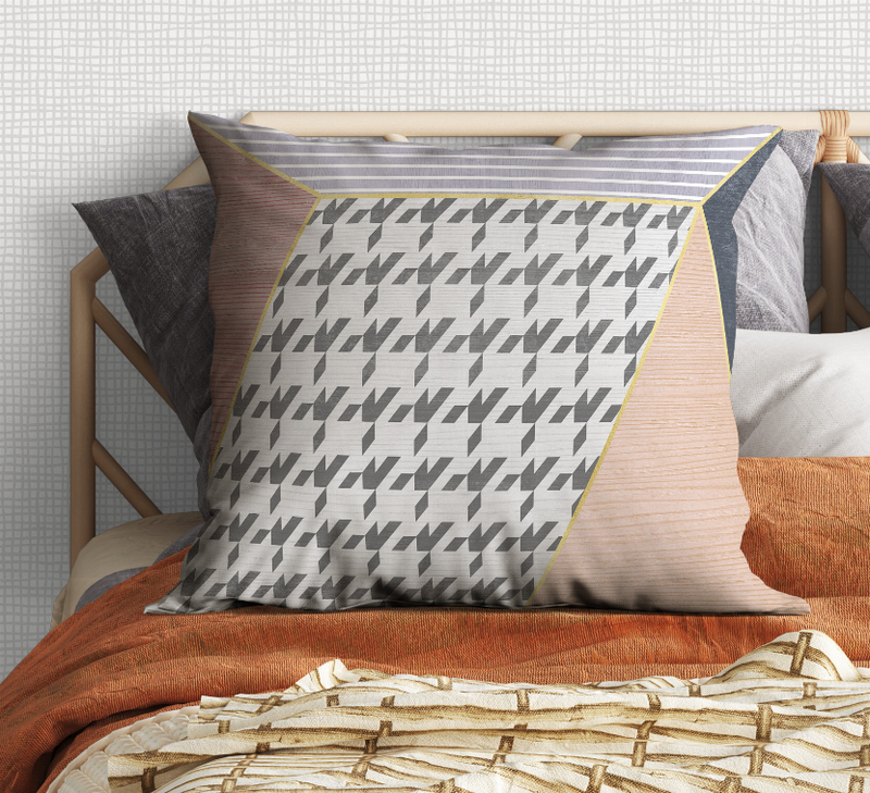 Geometric cushion pillow with black-and-white zigzag center and tan side panels
