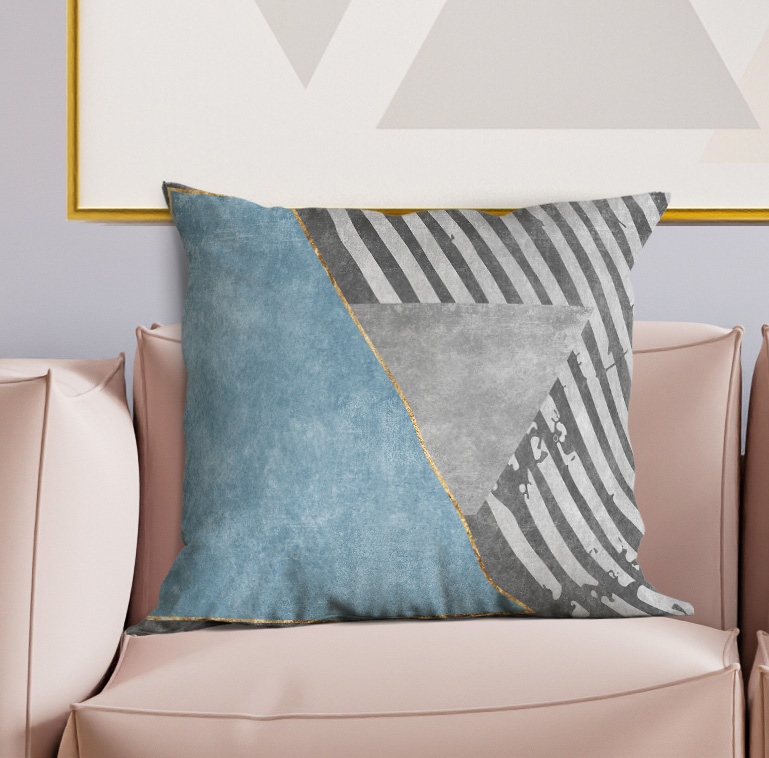 Multi-color square throw pillow with blue front, grey striped panel, and diagonal triangle accent