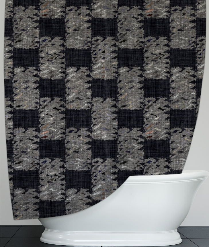Close-up of gray and black plaid shower curtain with textured patchwork squares