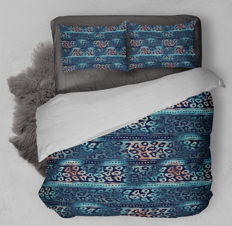 Blue patterned comforter set with two matching pillow shams