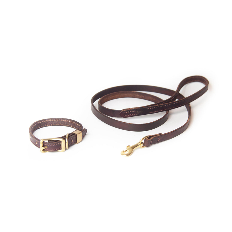 Hand-dyed burgundy full-grain leather dog leash with brass clasp and adjustable strap