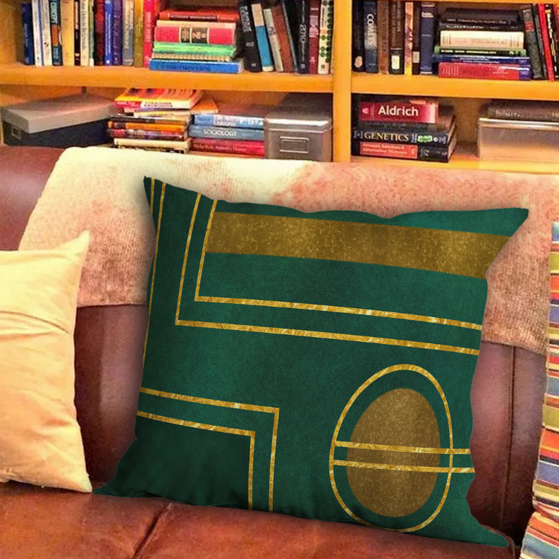 Blankets2U pillow with dark green cover and gold geometric lines and oval design