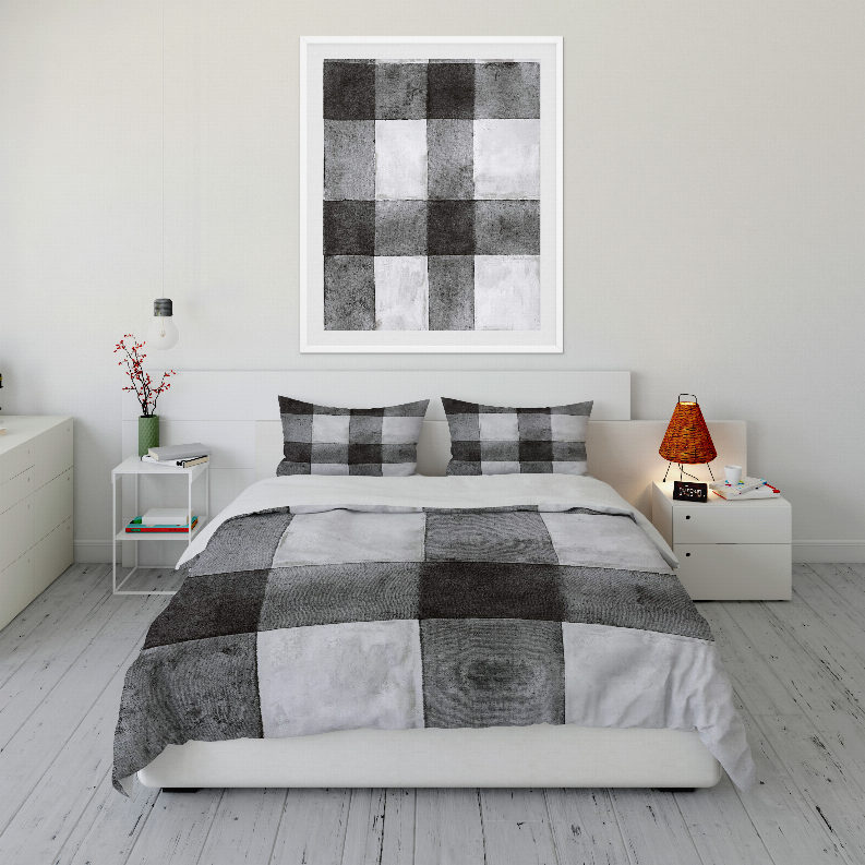 Grey and white check comforter set with matching pillowcases, patchwork squares
