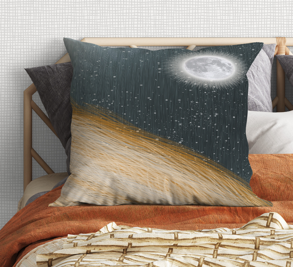 Teal and gold decorative pillow with diagonal streak and moon-like graphic