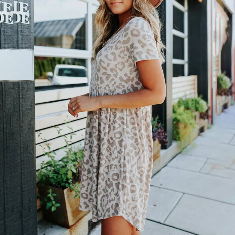 Women’s leopard print short-sleeve swing dress with gathered skirt detail