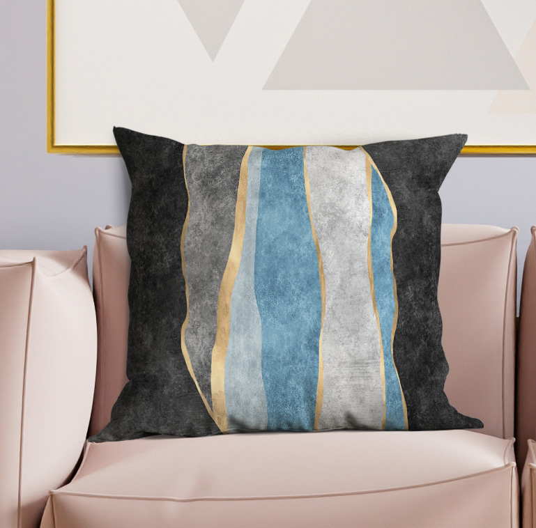 Square decorative pillow with dark gray fabric and vertical wavy stripe panel in blue and beige
