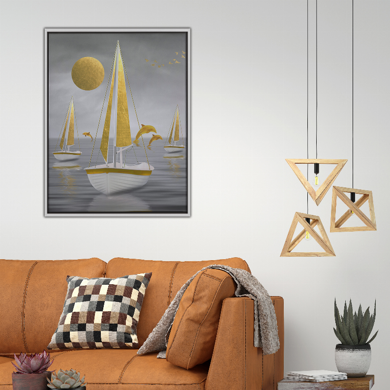 Framed sailboat art print with birds and gold accents, gray backdrop, black frame