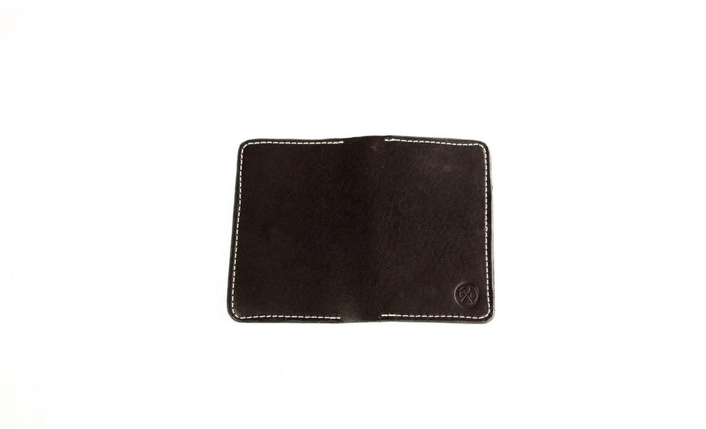 Wayfaring carry wallet back view, dark brown leather with stitched edges and logo