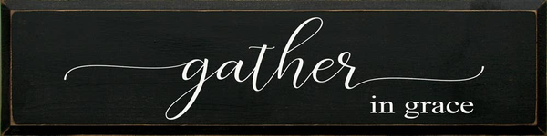 Dark rectangular wall sign with cursive "gather" and "in grace" text