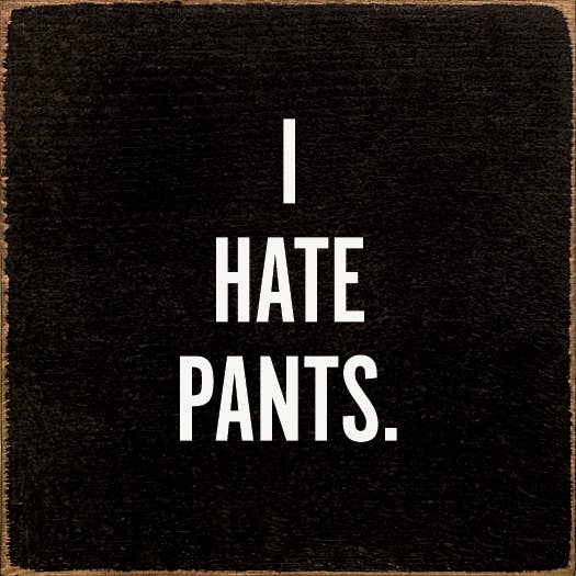 Black fabric patch with white "I HATE PANTS." text