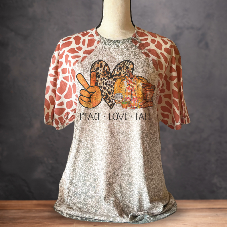 Gold glitter T-shirt with giraffe-print sleeves and Peace Love Fall front graphic