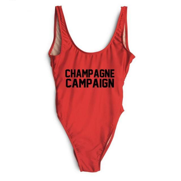 Red one-piece swimsuit with black CHAMPAGNE CAMPAIGN print and wide straps