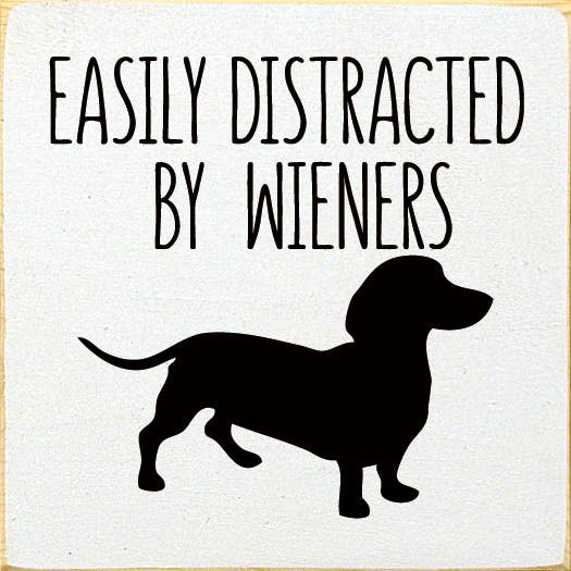 Wood sign with black dachshund and text: Easily Distracted by Wieners