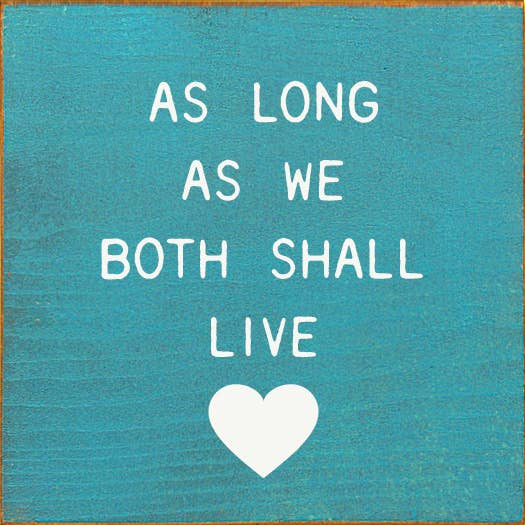 Turquoise canvas wall art with white quote text and a heart symbol