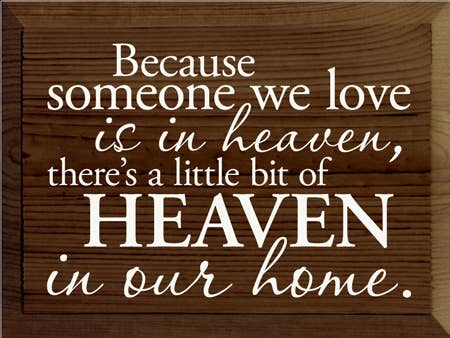 Wooden wall sign with 'Heaven' quote in decorative script