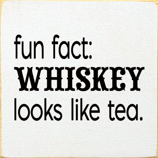Cream square coaster with black typography: fun fact: WHISKEY looks like tea.