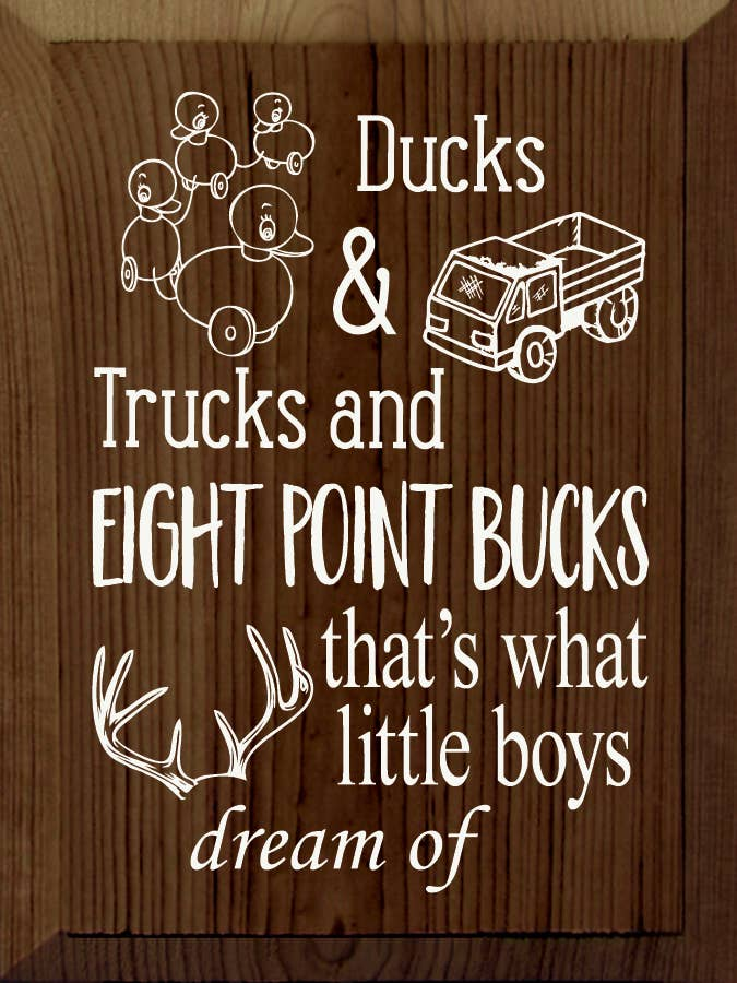 Wooden sign with white lettering: Ducks & Trucks and Eight Point Bucks