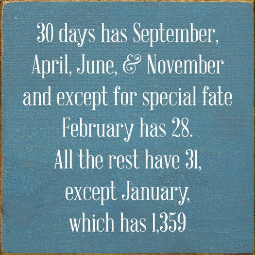 Blue rectangular quote wall plaque with white lettering