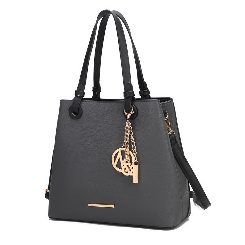 Charcoal tote bag with top handles, front pocket, and gold chain logo charm
