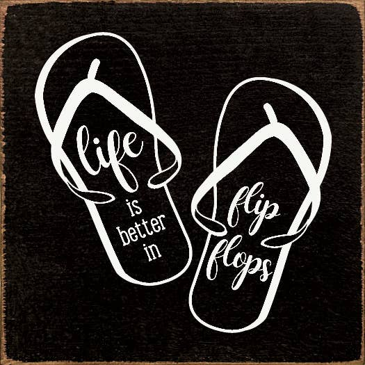 Flip flops with white logo text and icon on dark fabric