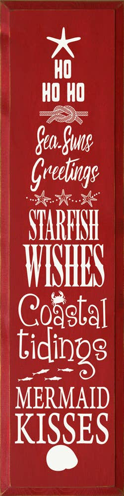 Red vertical holiday sign with white text, starfish, and sea-suns wishes design