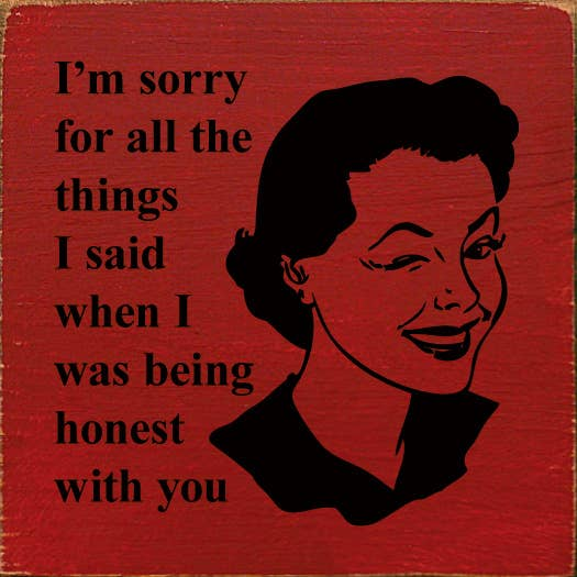 Red quote wall art with stylized woman portrait and black lettering