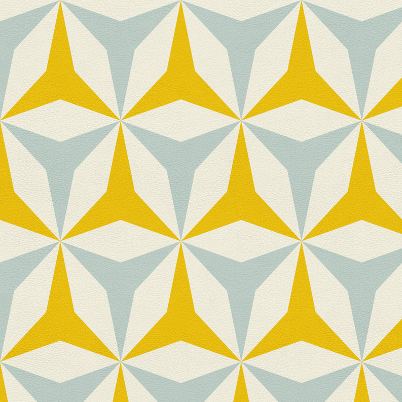 Geometric non-slip rug with yellow geometric facets on light blue and white.