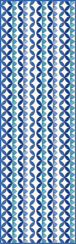 Non-slip indoor/outdoor rug with blue and white geometric ripple pattern