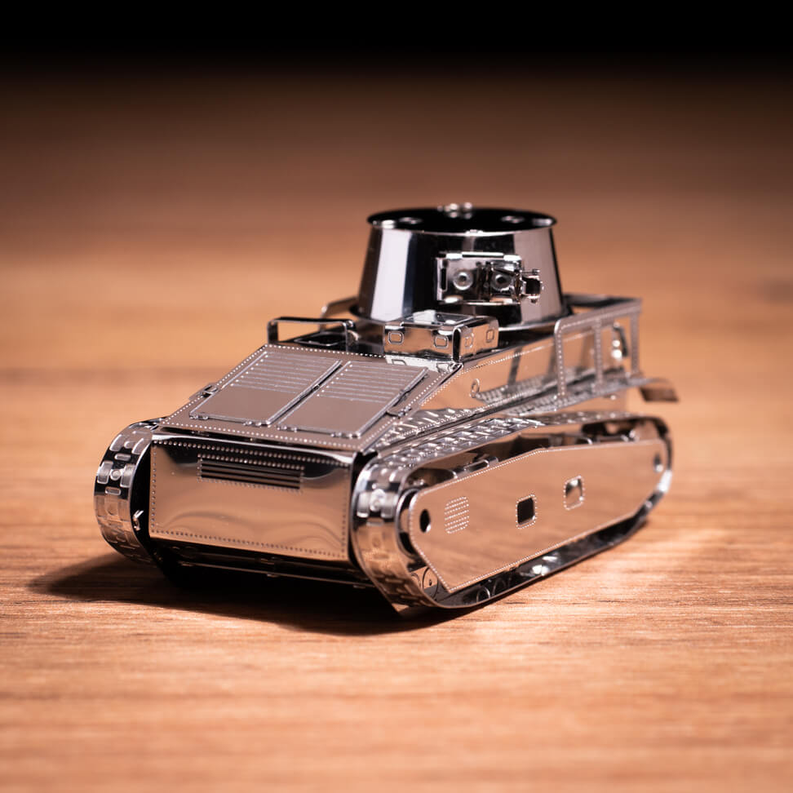 Metal tracked tank model with turret and side armor plates