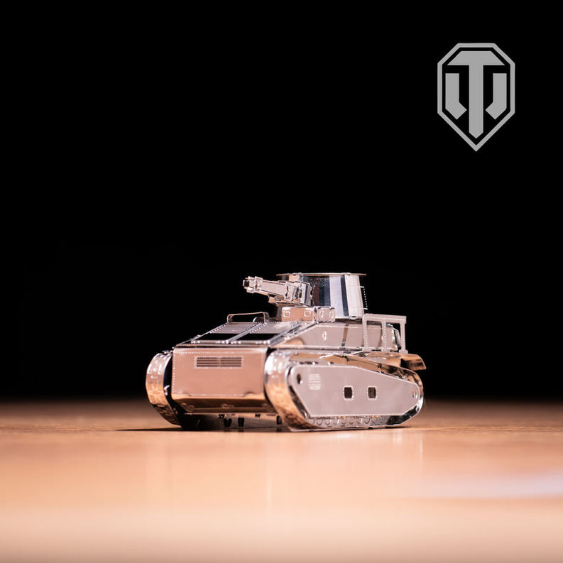 Tan armored tracked tank model with metallic details on display