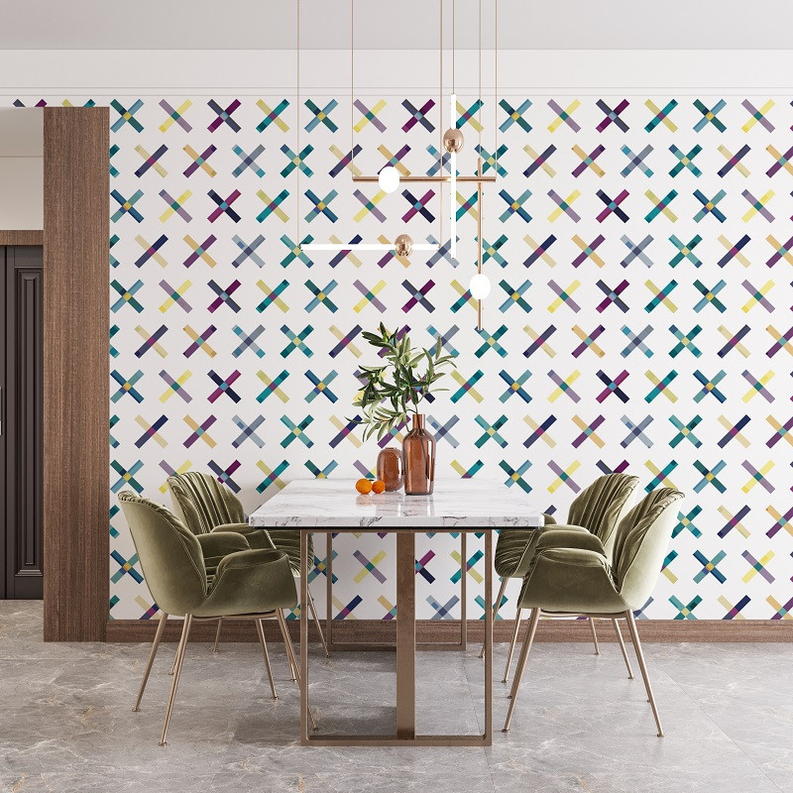 Geometric peel-and-stick wallpaper with multicolor X pattern on dining wall