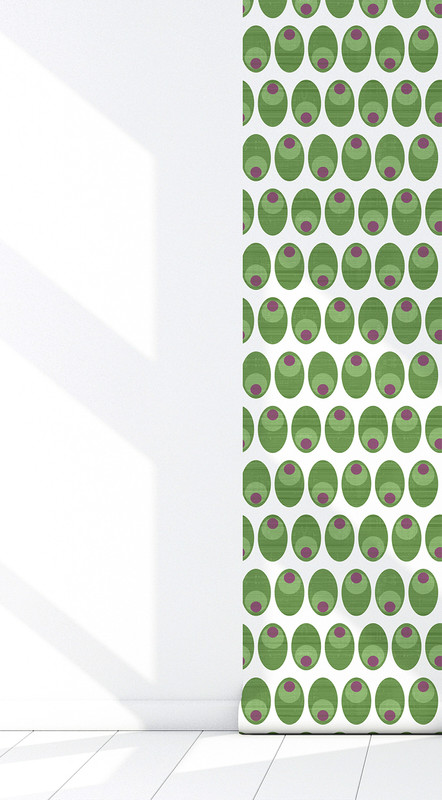 Peel-and-stick wallpaper installed on wall corner, green ovals with magenta dots