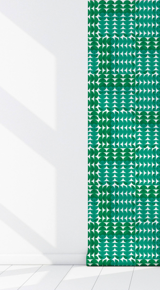 Green geometric peel-and-stick wallpaper panel corner with repeating circle pattern.