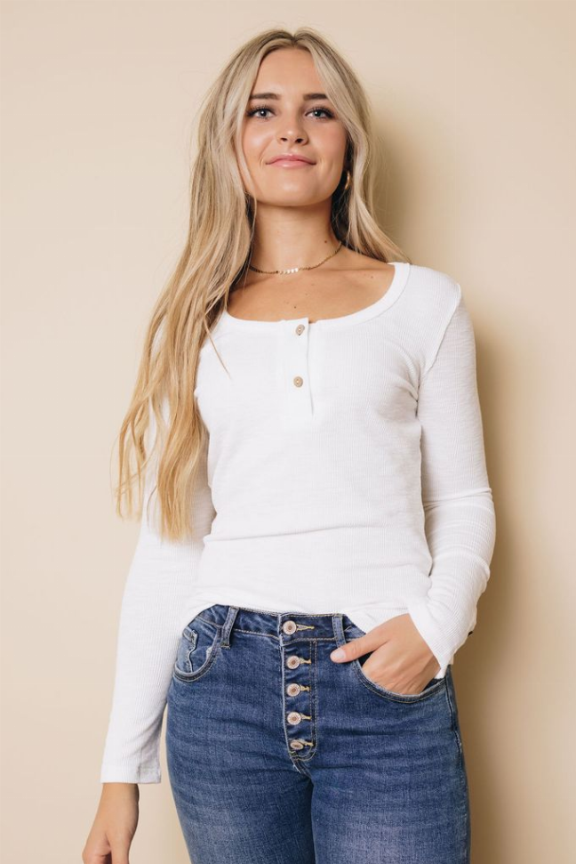 White long-sleeve henley top with 3-button placket and scoop neck, front view