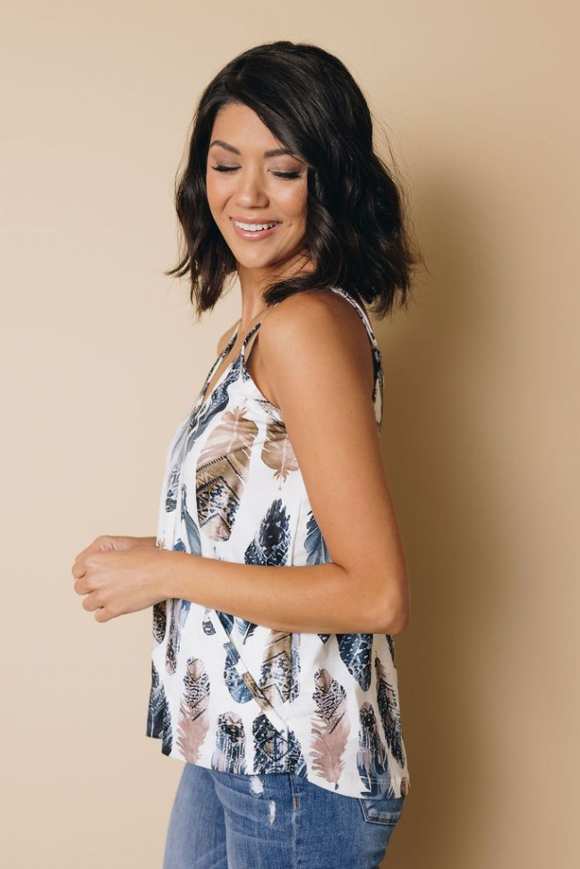 Women's feather-print tank top, thin straps, side profile, blue and tan tones