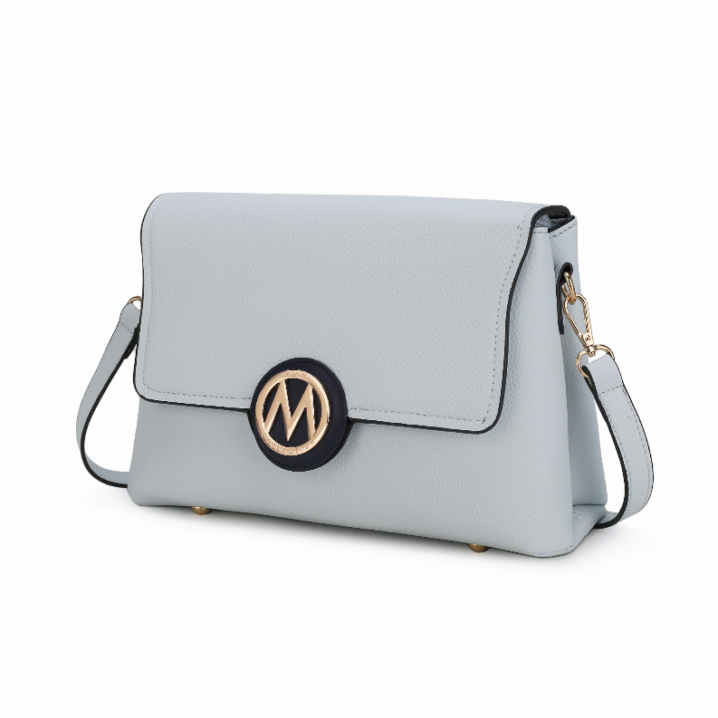Light gray crossbody bag, front flap closure with round emblem and side strap loops.