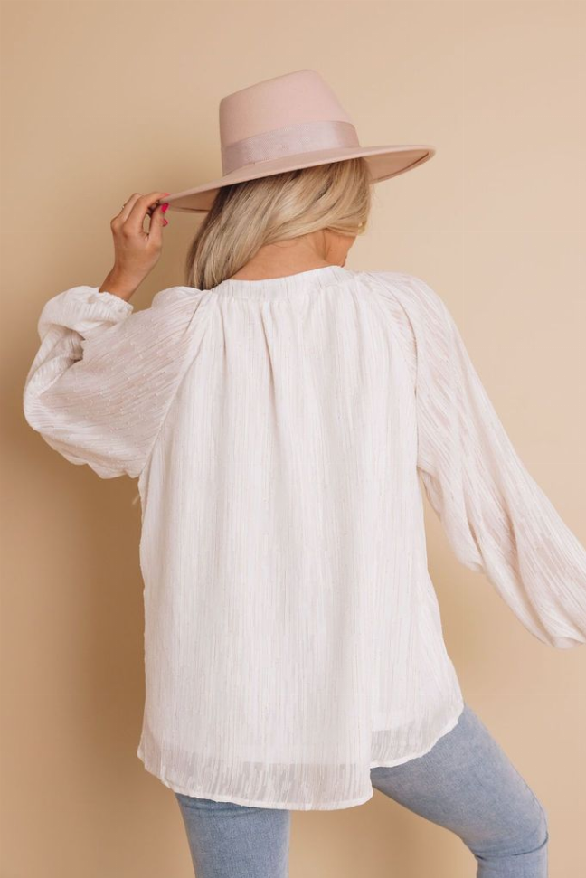 White long-sleeve blouse top with gathered back and puff sleeves