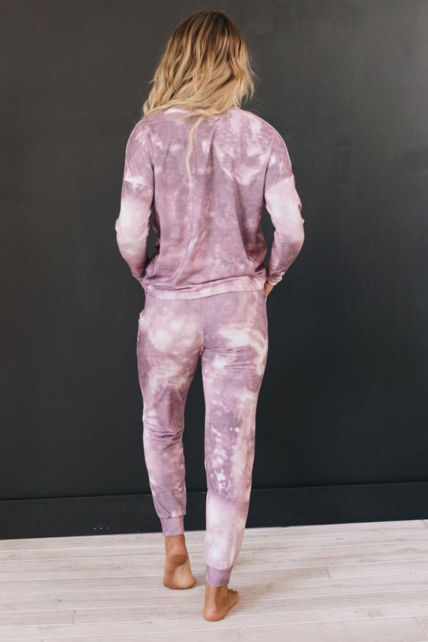Pink tie-dye loungewear set with long-sleeve top and matching jogger pants, back view