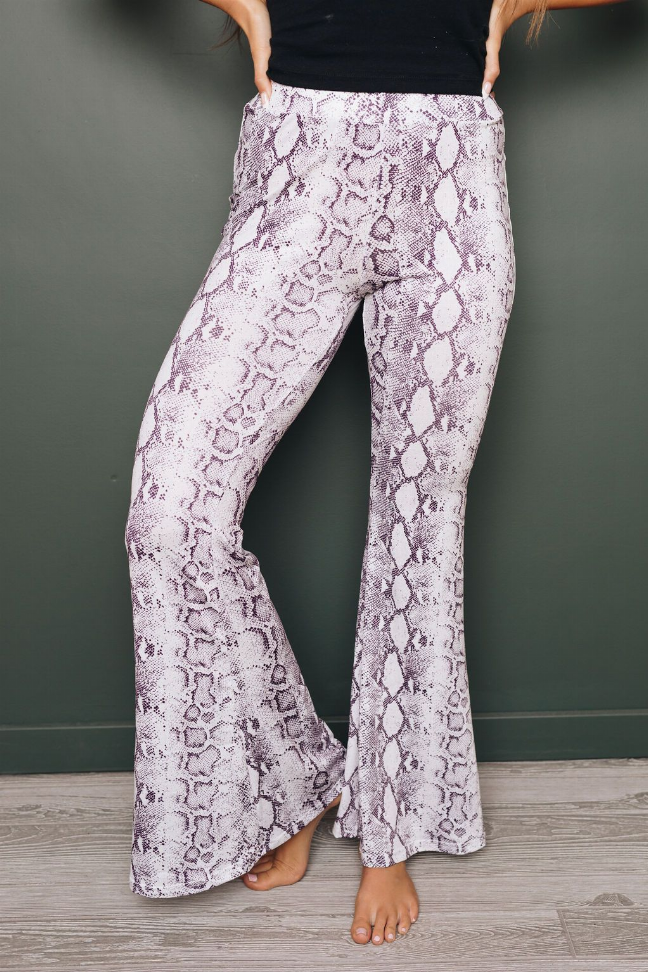 Purple snakeskin-print wide-leg pants, front view with straight seam