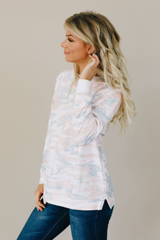 Light blue and white camo pullover with long sleeves and crew neck