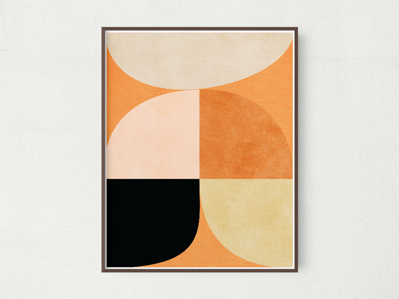 Framed abstract wall art with orange, beige, and black semicircle sections