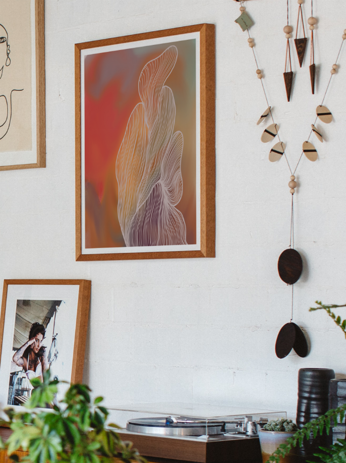 Framed abstract artwork with orange, lilac, and dark purple layered line curves