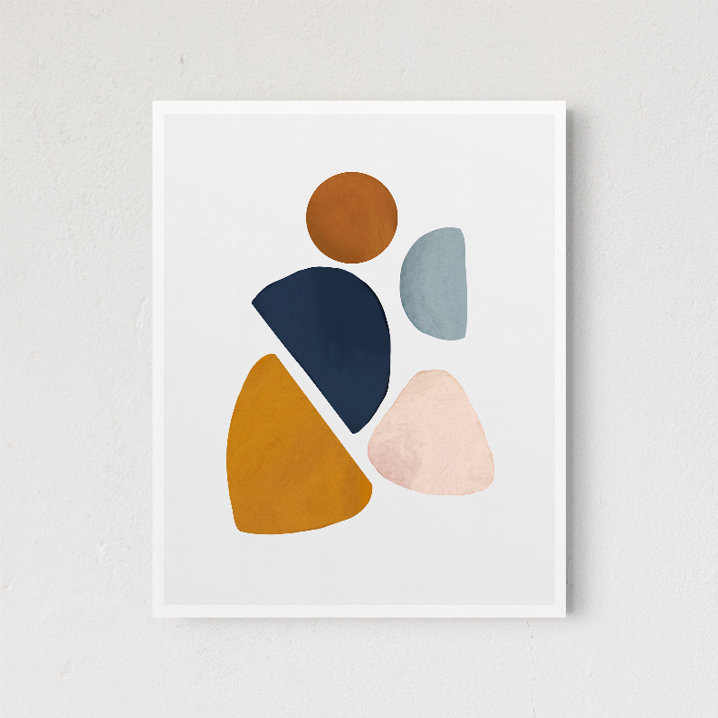 White-framed abstract art with terracotta circle and layered rounded shapes in navy, mustard, blush