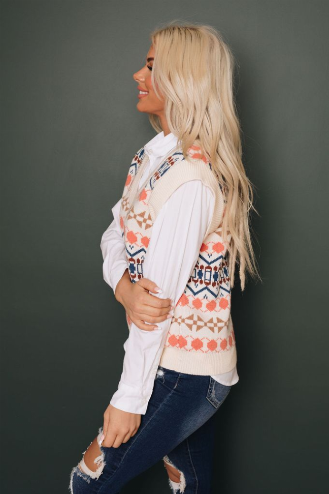 Sleeveless knitted vest with tribal geometric print, cream with coral and navy