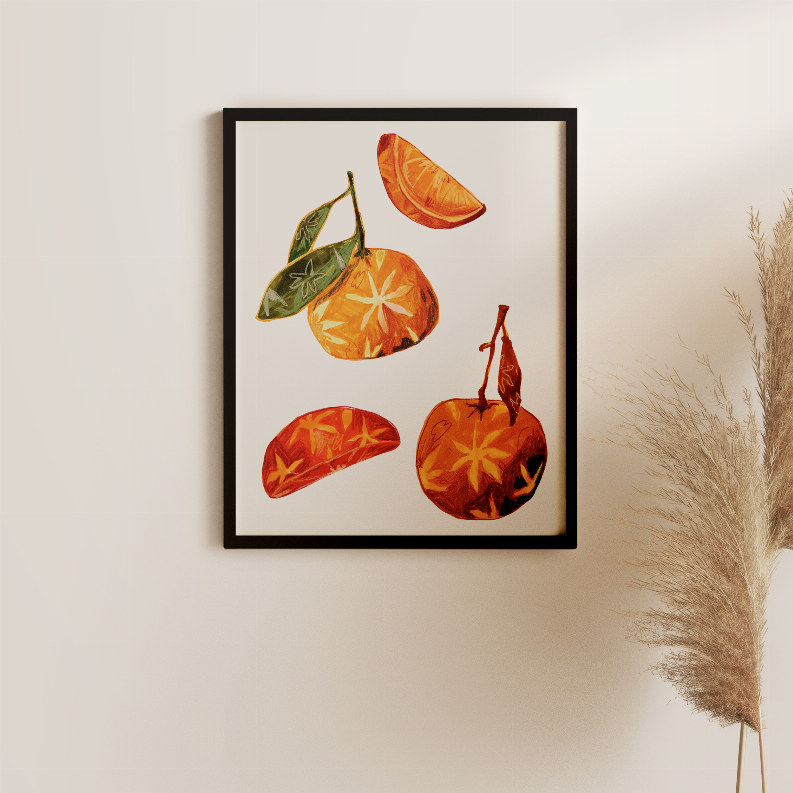Black-framed orange and star-anise still-life print with whole fruit, slices, and leaves