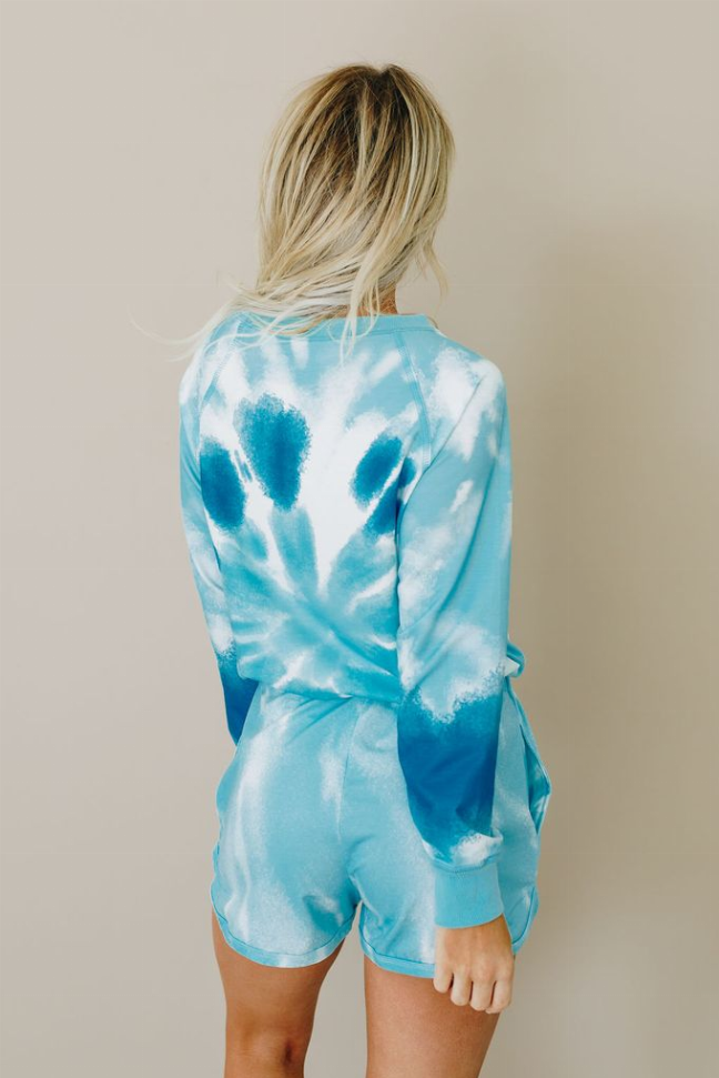 Blue tie-dye lounge set with long-sleeve crewneck top and drawstring shorts, back view
