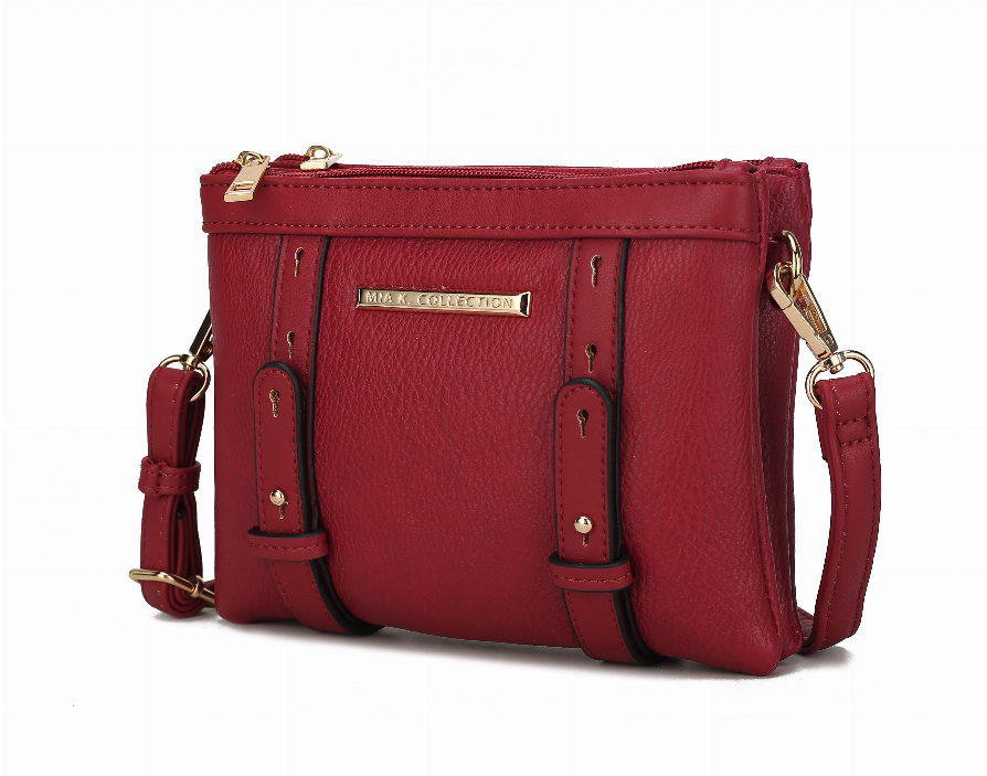 Red multi-compartment crossbody bag front with gold hardware, dual straps, and zip top