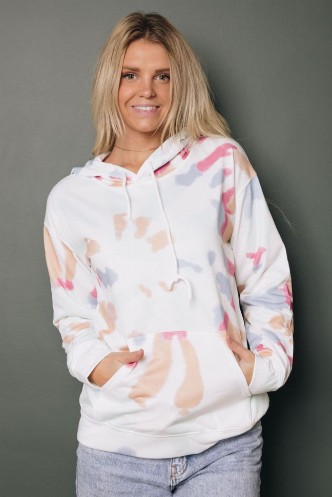 White tie-dye hoodie with pink/peach splatter, pullover hood, front pouch pocket, front view