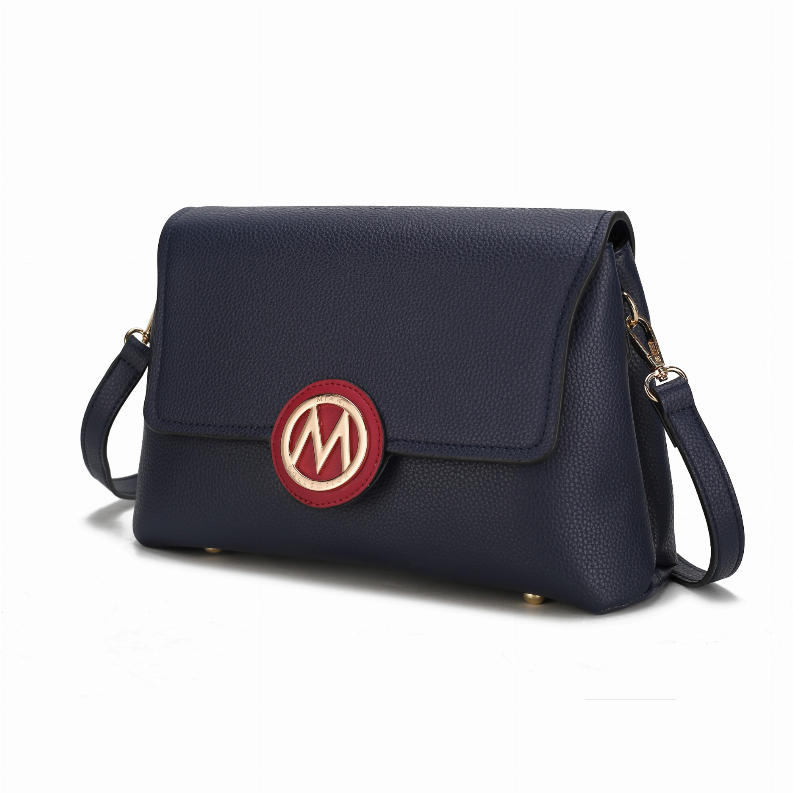 Dark navy crossbody bag with magnetic flap, round emblem, and adjustable strap